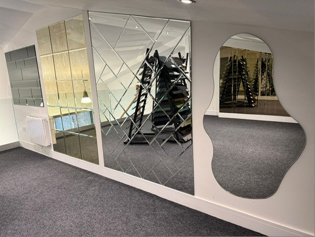 Mirror feature wall display Radcliffe showroom